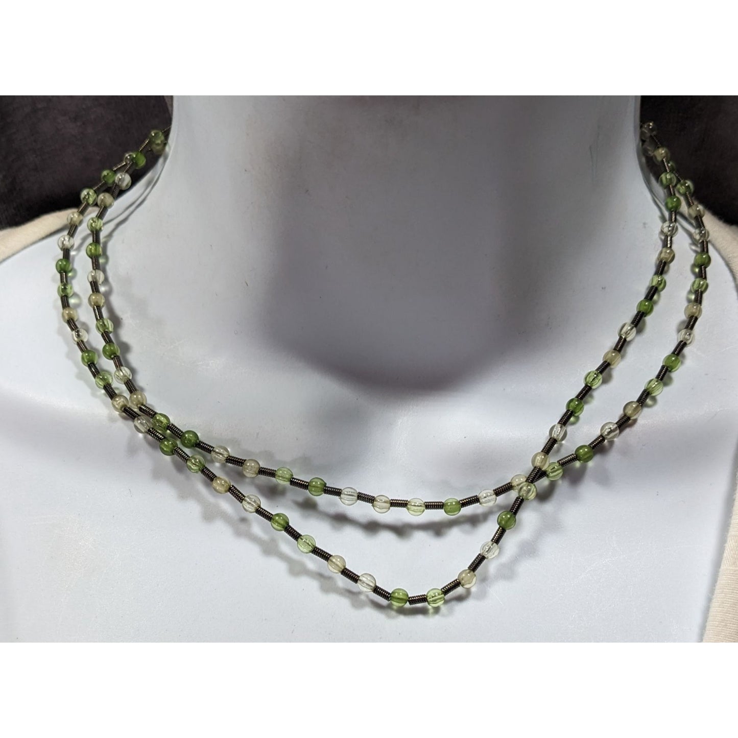 Earthy Clear And Green Glass Necklace With Metal Coil Spacers