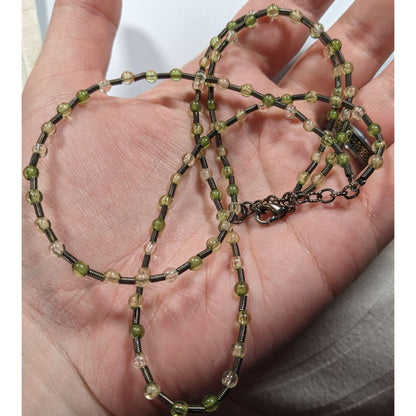 Earthy Clear And Green Glass Necklace With Metal Coil Spacers