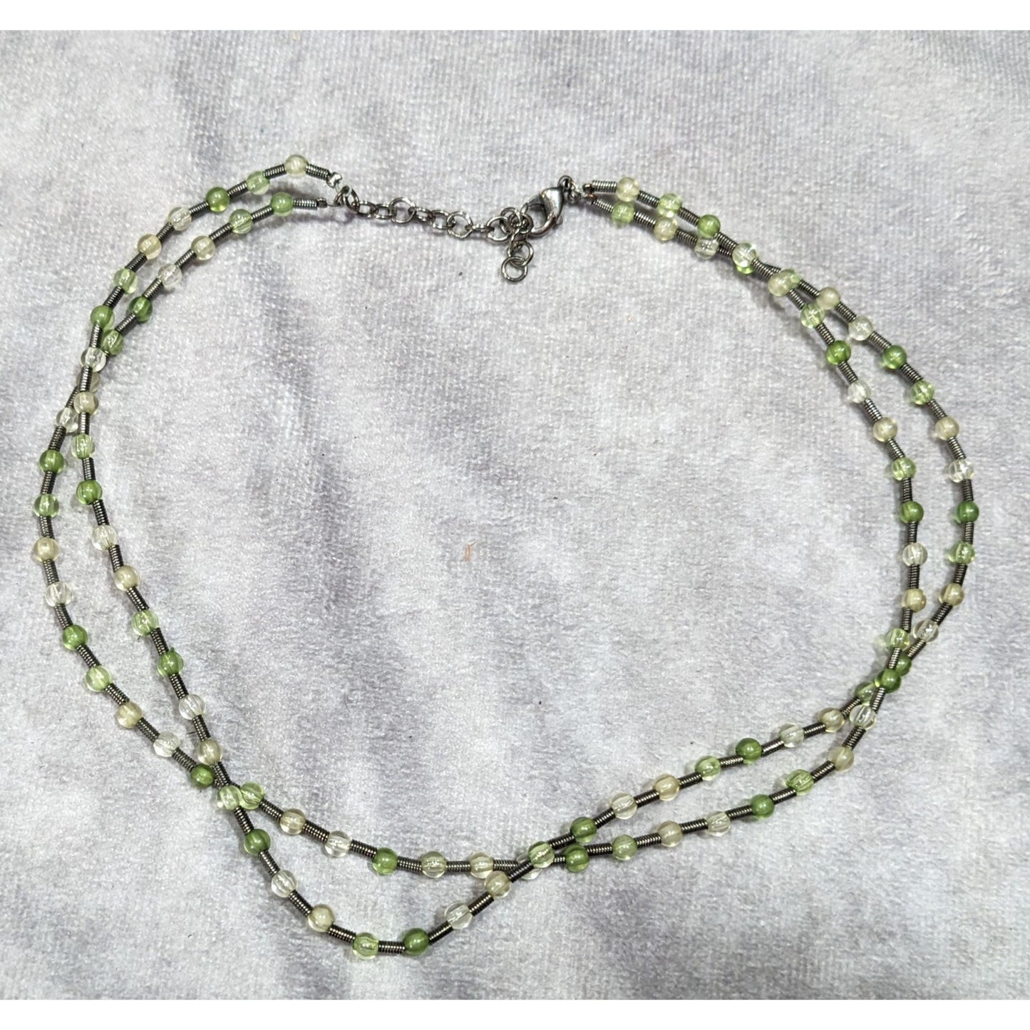 Earthy Clear And Green Glass Necklace With Metal Coil Spacers