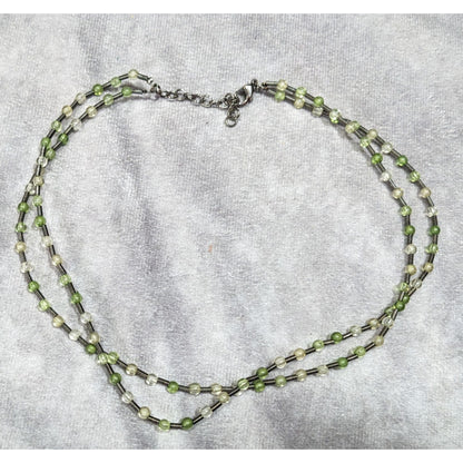 Earthy Clear And Green Glass Necklace With Metal Coil Spacers