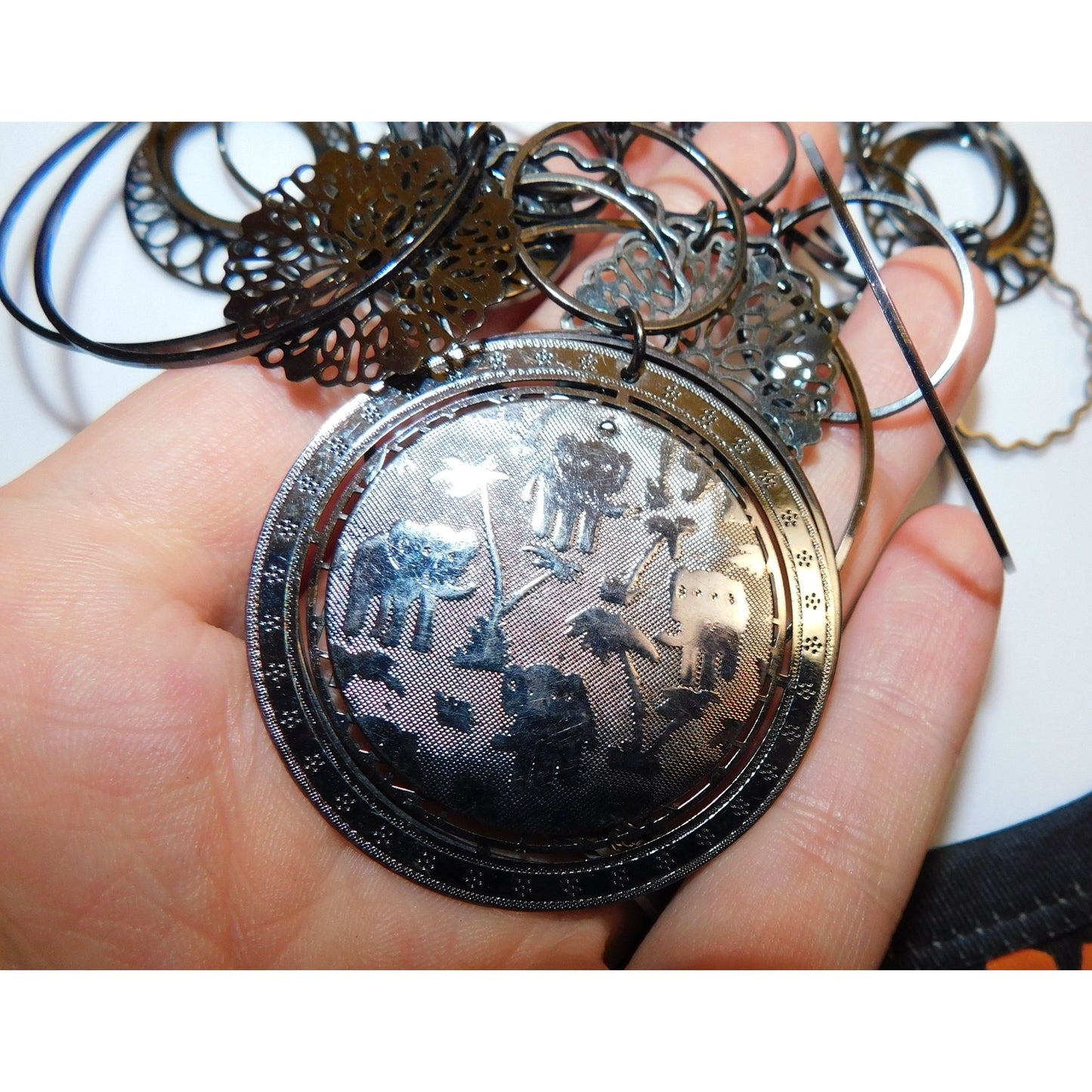 Abstract Floral Elephant Silver Tone Medallion Necklace