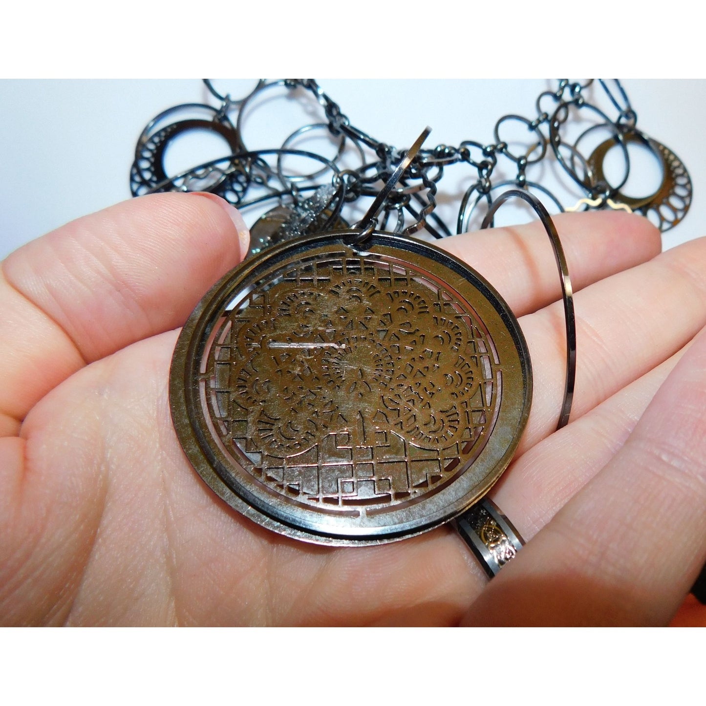 Abstract Floral Elephant Silver Tone Medallion Necklace