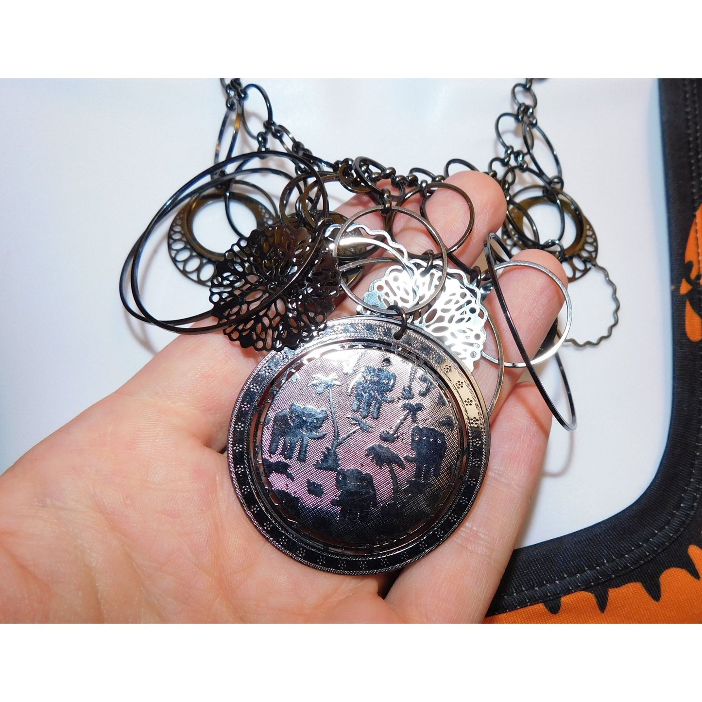 Abstract Floral Elephant Silver Tone Medallion Necklace