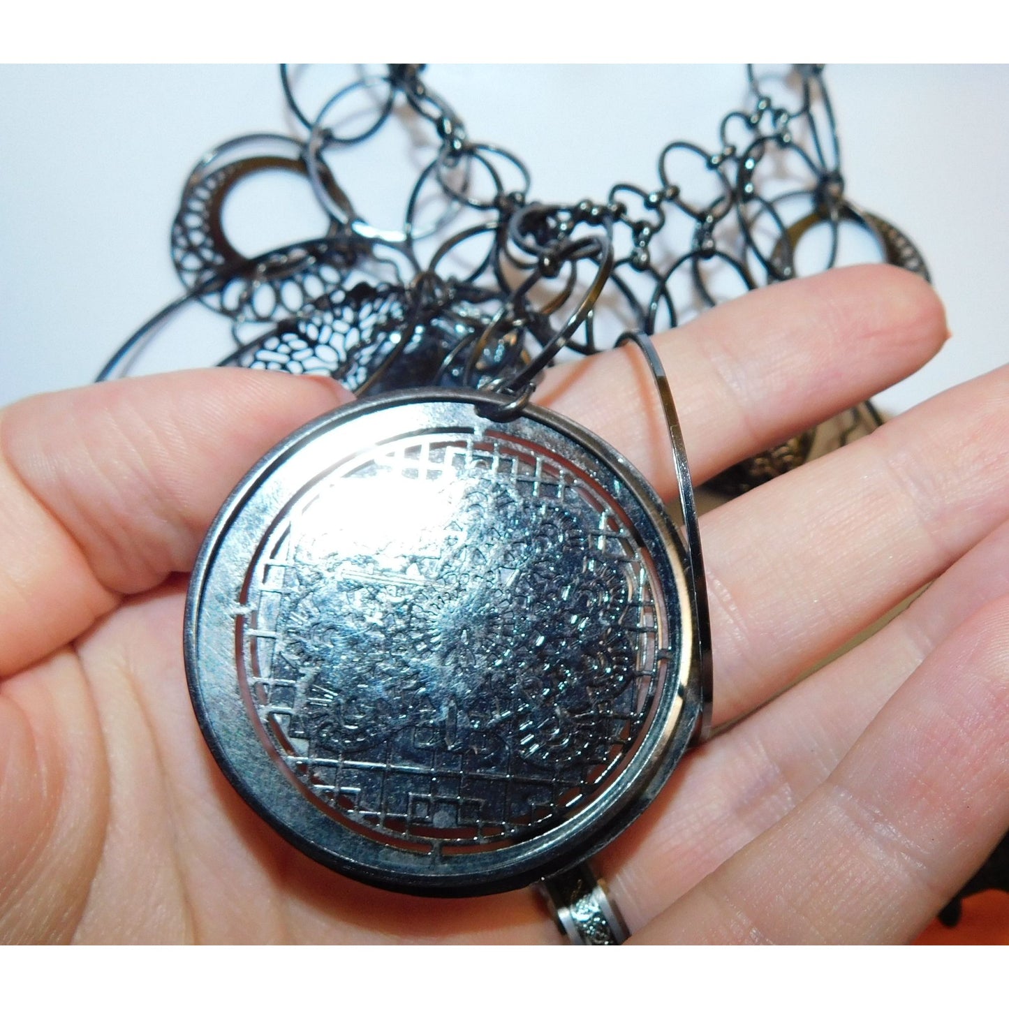 Abstract Floral Elephant Silver Tone Medallion Necklace