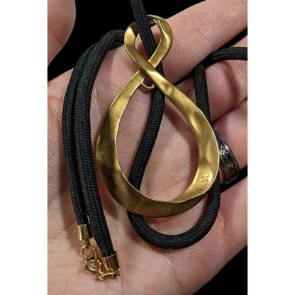 Vintage Avon Elegant Gold Tone Infinity Pendant Necklace