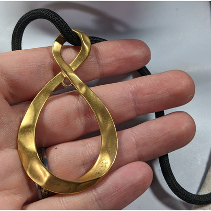 Vintage Avon Elegant Gold Tone Infinity Pendant Necklace