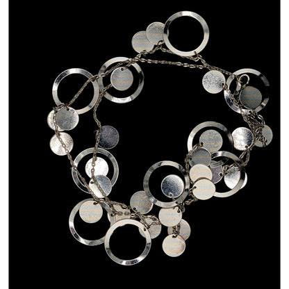 Vintage Glam Silver Tone Disc And Charm Necklace On Opera Length Chain