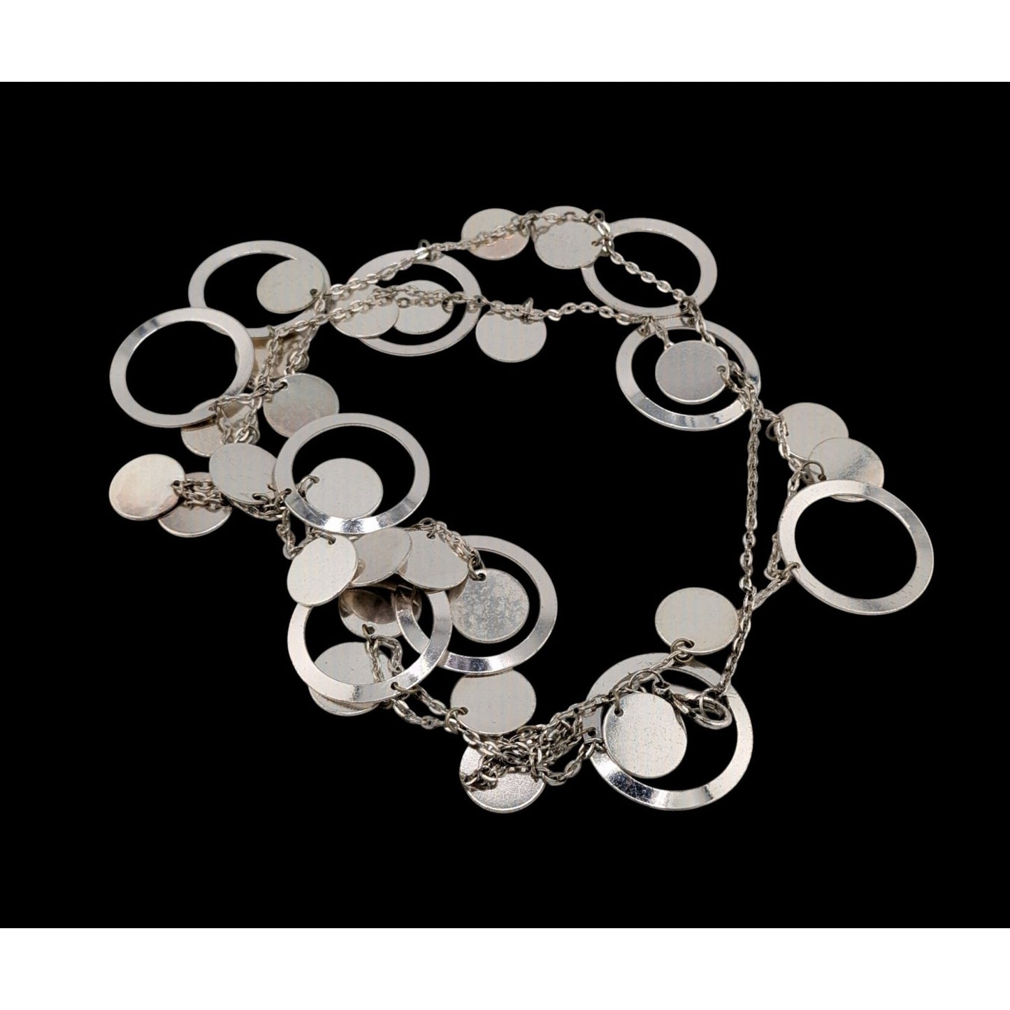 Vintage Glam Silver Tone Disc And Charm Necklace On Opera Length Chain