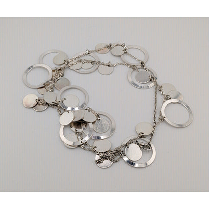 Vintage Glam Silver Tone Disc And Charm Necklace On Opera Length Chain