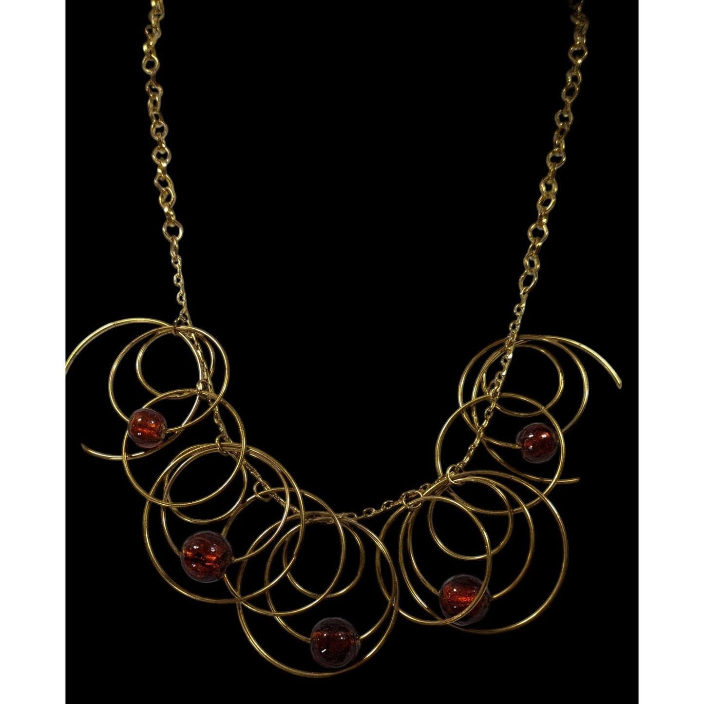 Modern Gold Tone Loop Necklace With Brown Beaded Accents