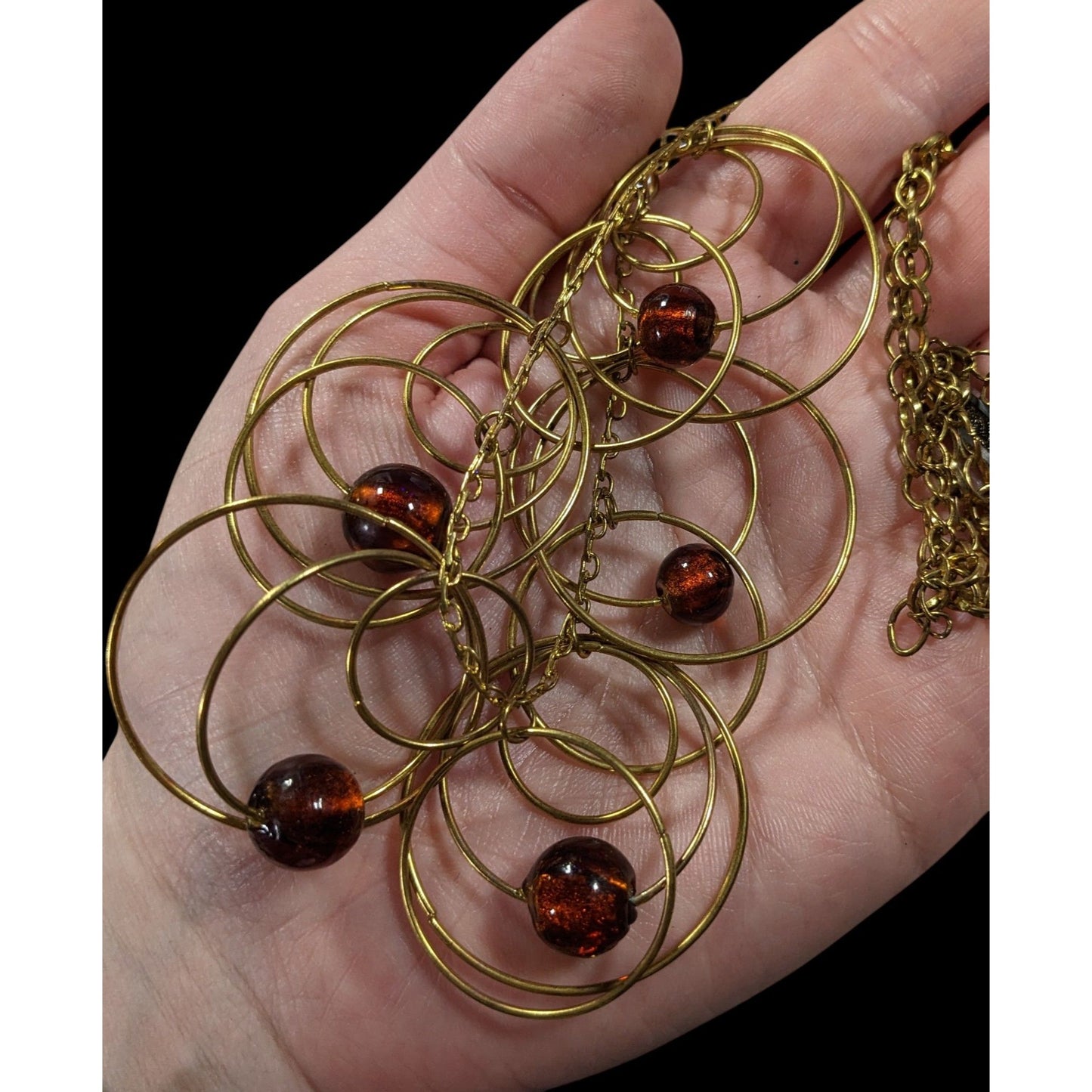Modern Gold Tone Loop Necklace With Brown Beaded Accents