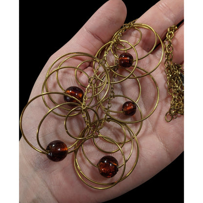 Modern Gold Tone Loop Necklace With Brown Beaded Accents