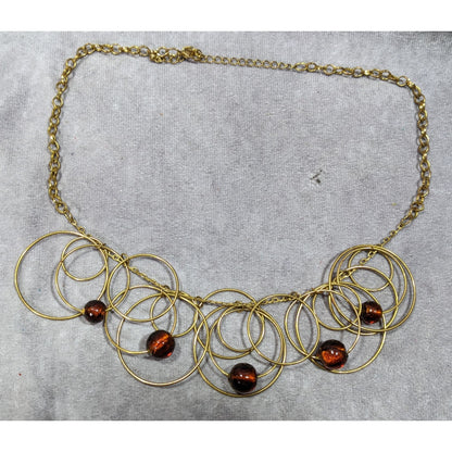 Modern Gold Tone Loop Necklace With Brown Beaded Accents