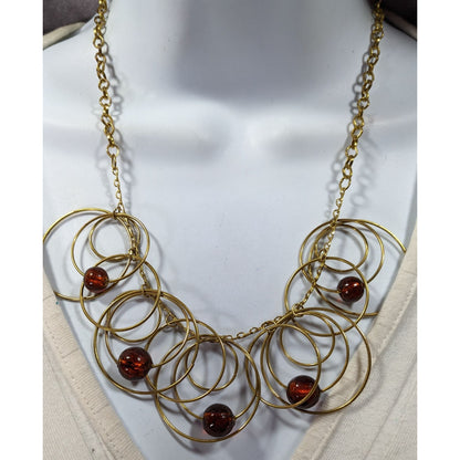 Modern Gold Tone Loop Necklace With Brown Beaded Accents