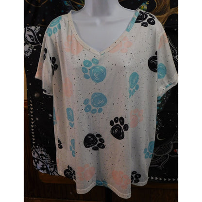 Pastel Paw Print Tee With 90s Style Graphic Design