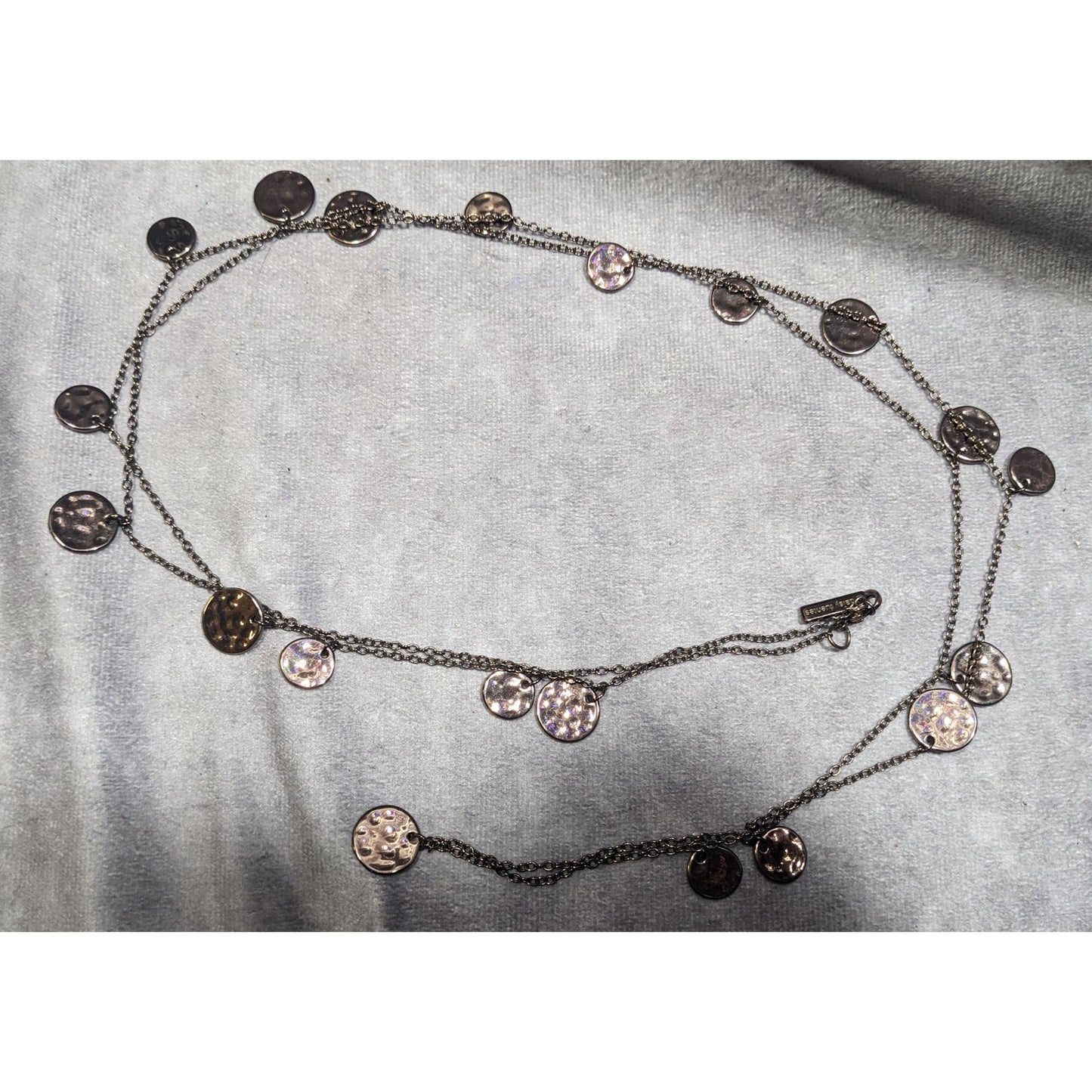 Daisy Fuentes Bronze Tone Hammered Disc Opera Length Charm Necklace