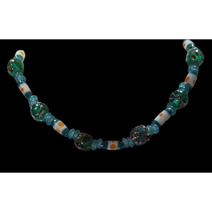 Handcrafted Blue Glass Beaded Necklace With Swirled Green And White Accents