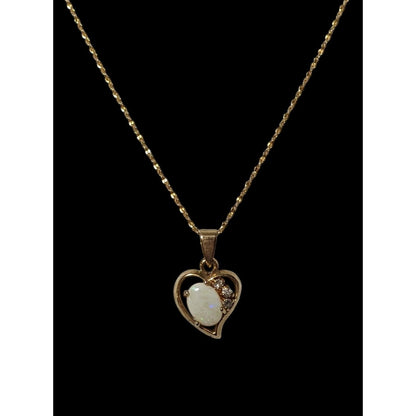 Nakagawa Corporation Gold Tone Opal Gemmed Heart Necklace