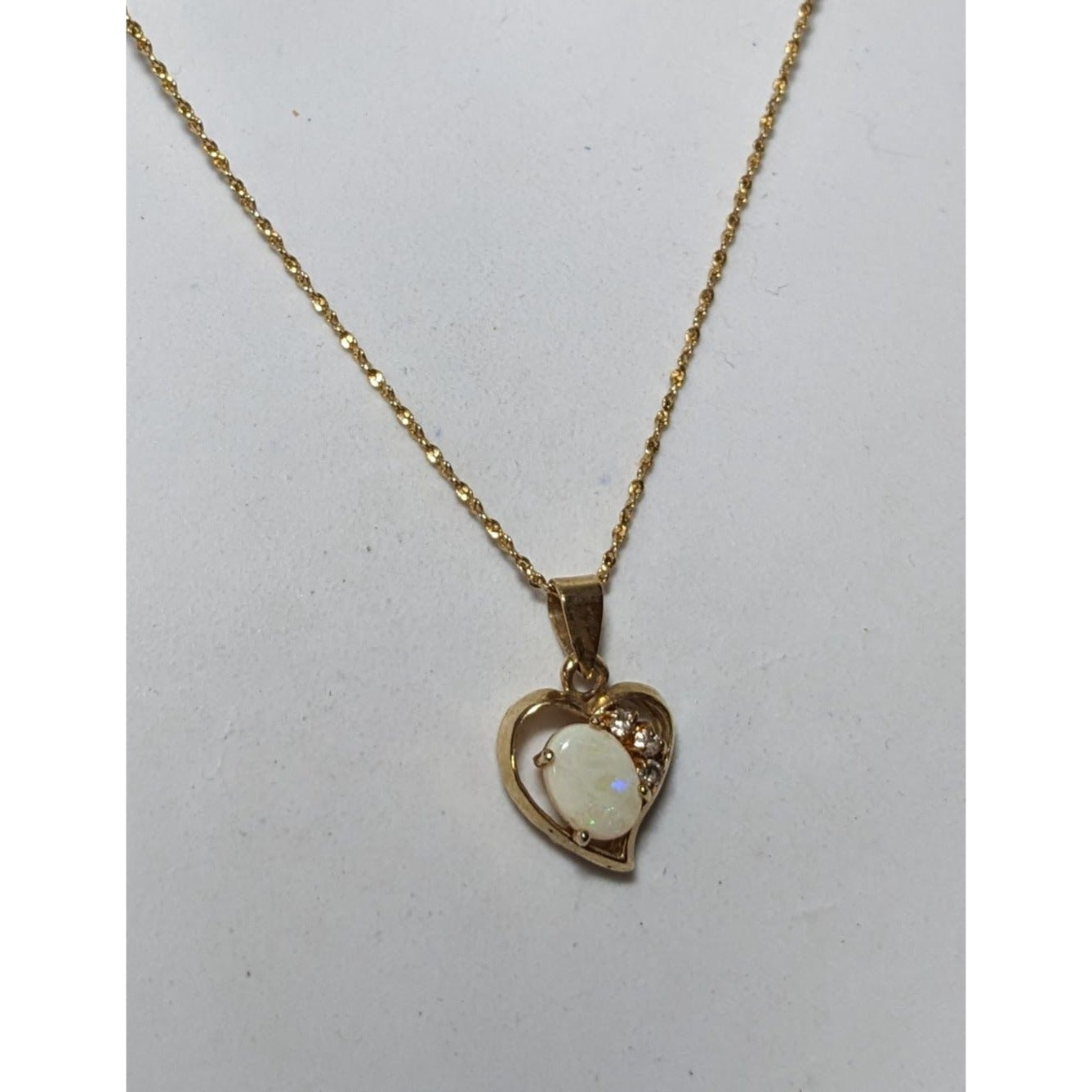 Nakagawa Corporation Gold Tone Opal Gemmed Heart Necklace