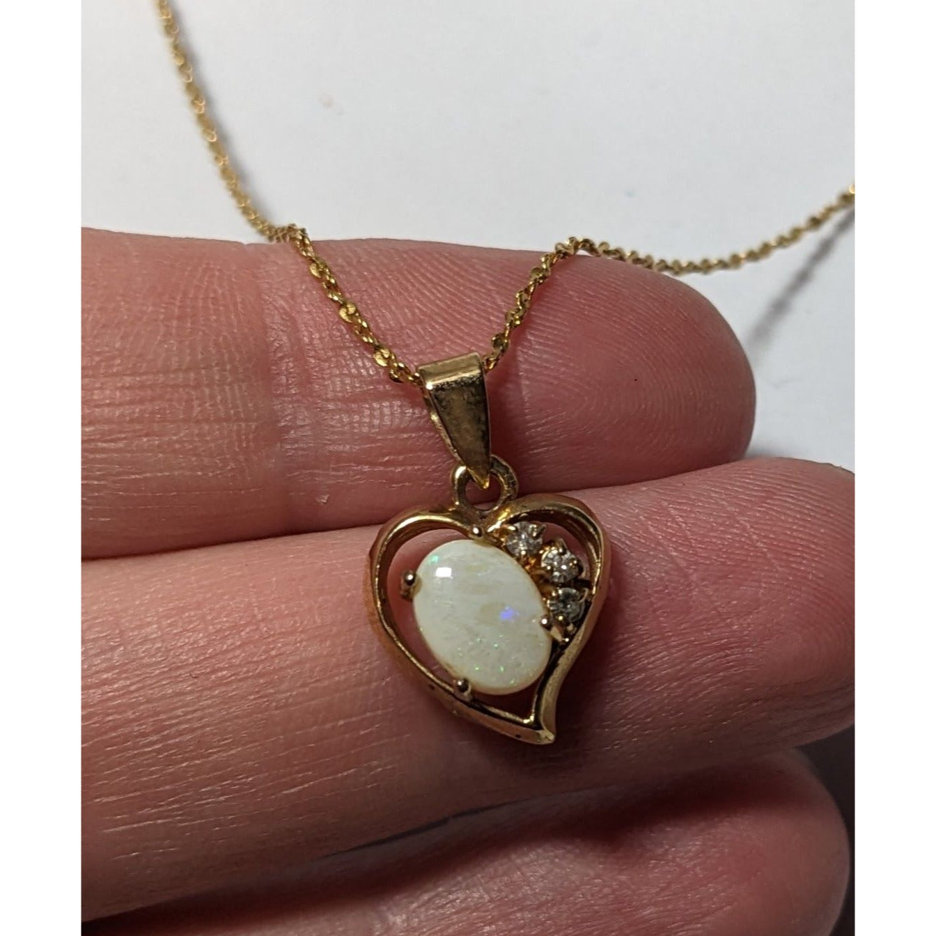 Nakagawa Corporation Gold Tone Opal Gemmed Heart Necklace