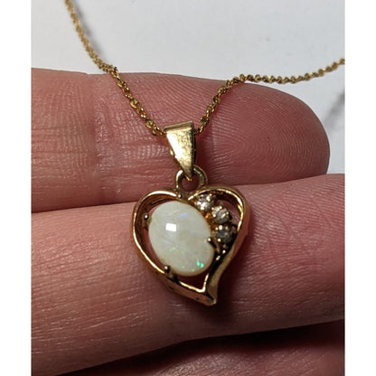 Nakagawa Corporation Gold Tone Opal Gemmed Heart Necklace