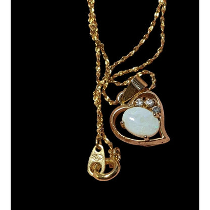 Nakagawa Corporation Gold Tone Opal Gemmed Heart Necklace