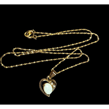 Nakagawa Corporation Gold Tone Opal Gemmed Heart Necklace