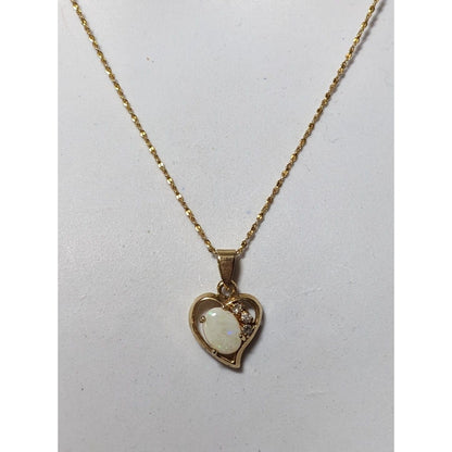 Nakagawa Corporation Gold Tone Opal Gemmed Heart Necklace