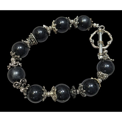 Handcrafted Gothic Black Beaded Bracelet With Intricate Silver Accents