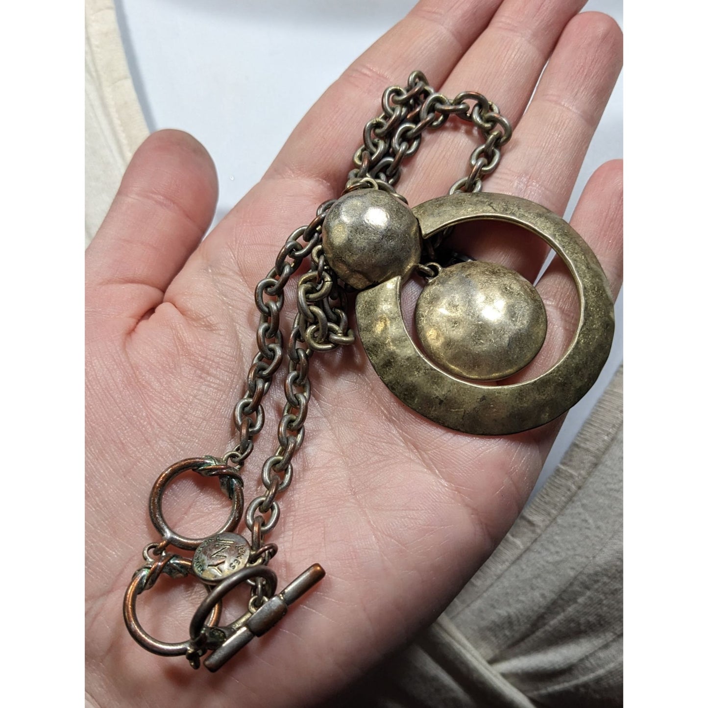 Jones New York Brutalist Gold Tone Hammered Circle In Circle Pendant Necklace